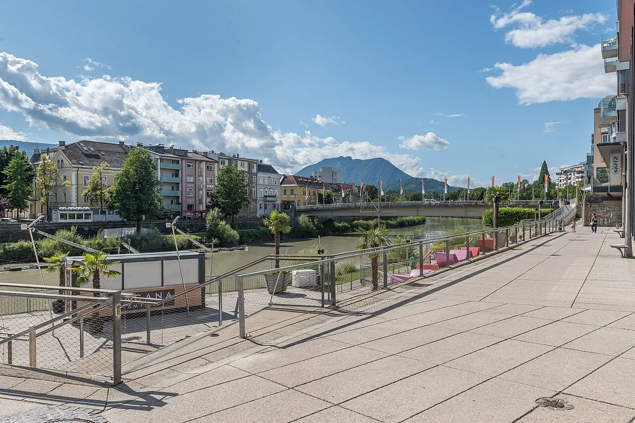 The River Drau terraces and city bridge in Villach